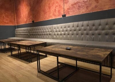 Three Monkeys Cannabis Club lounge room with sofa large view